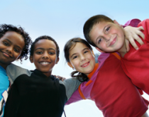 A group of children standing next to each other.